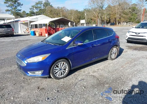 2015 Ford Focus Titanium z USA, uszkodzony, nr VIN 1FADP3N26FL205067